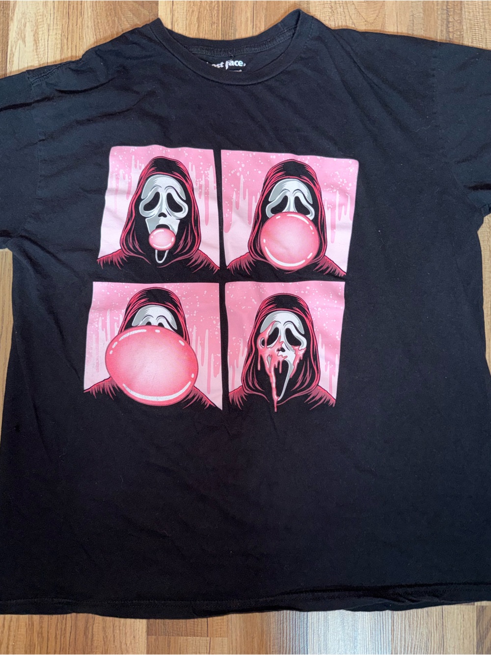 Black Graphic Tee with Pink Bubble Mask Design